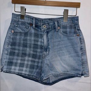 American eagle cross over jean shorts with plaid print.